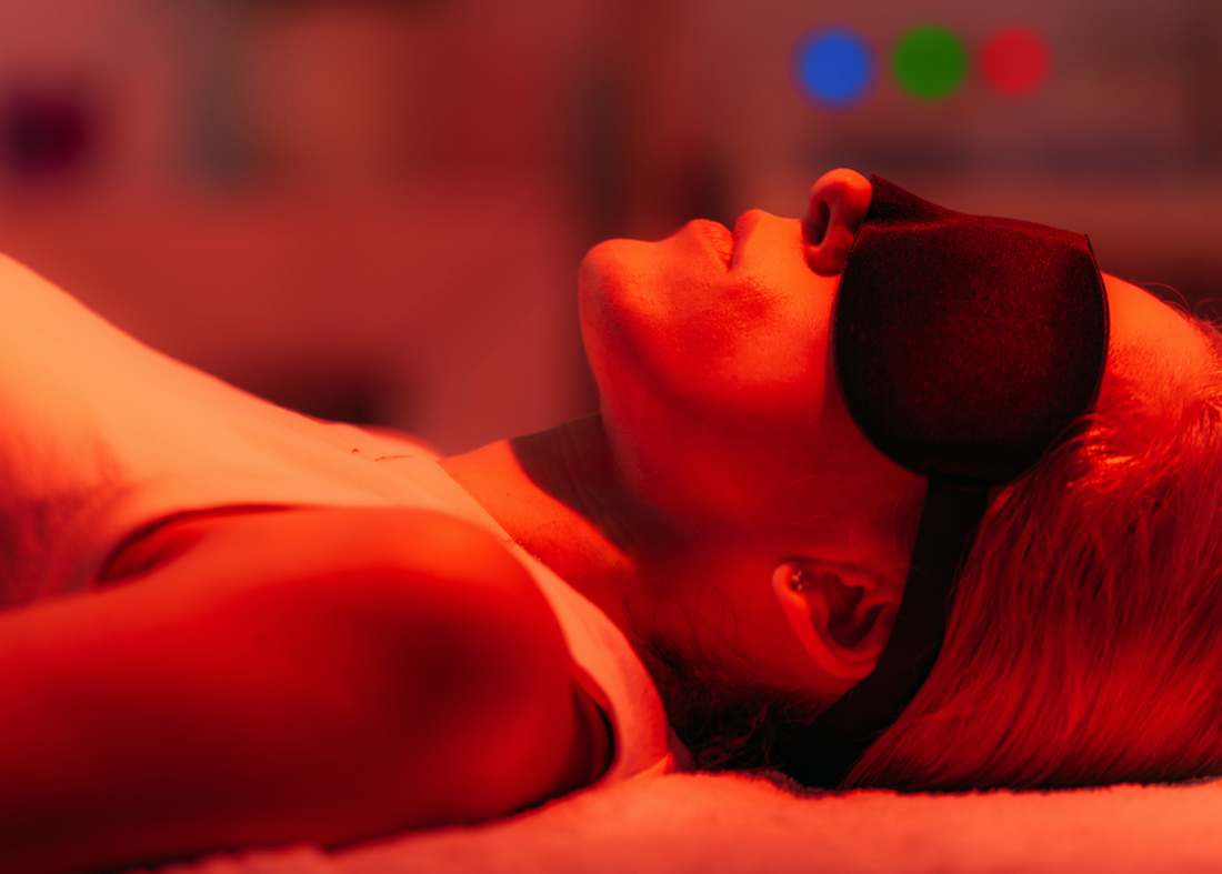 Woman lying down having Red Light Therapy